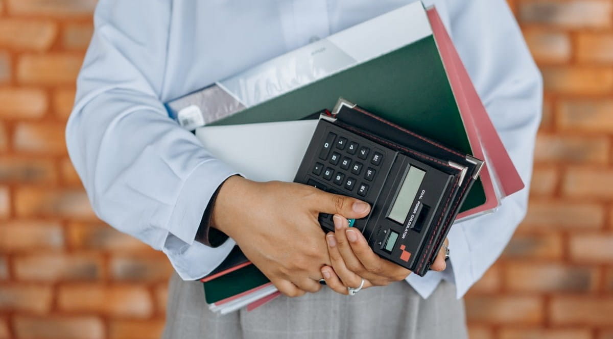 Person holding office equipment