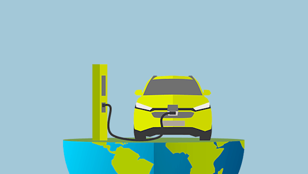 An electric car sitting on top of the bottom hemisphere of planet Earth