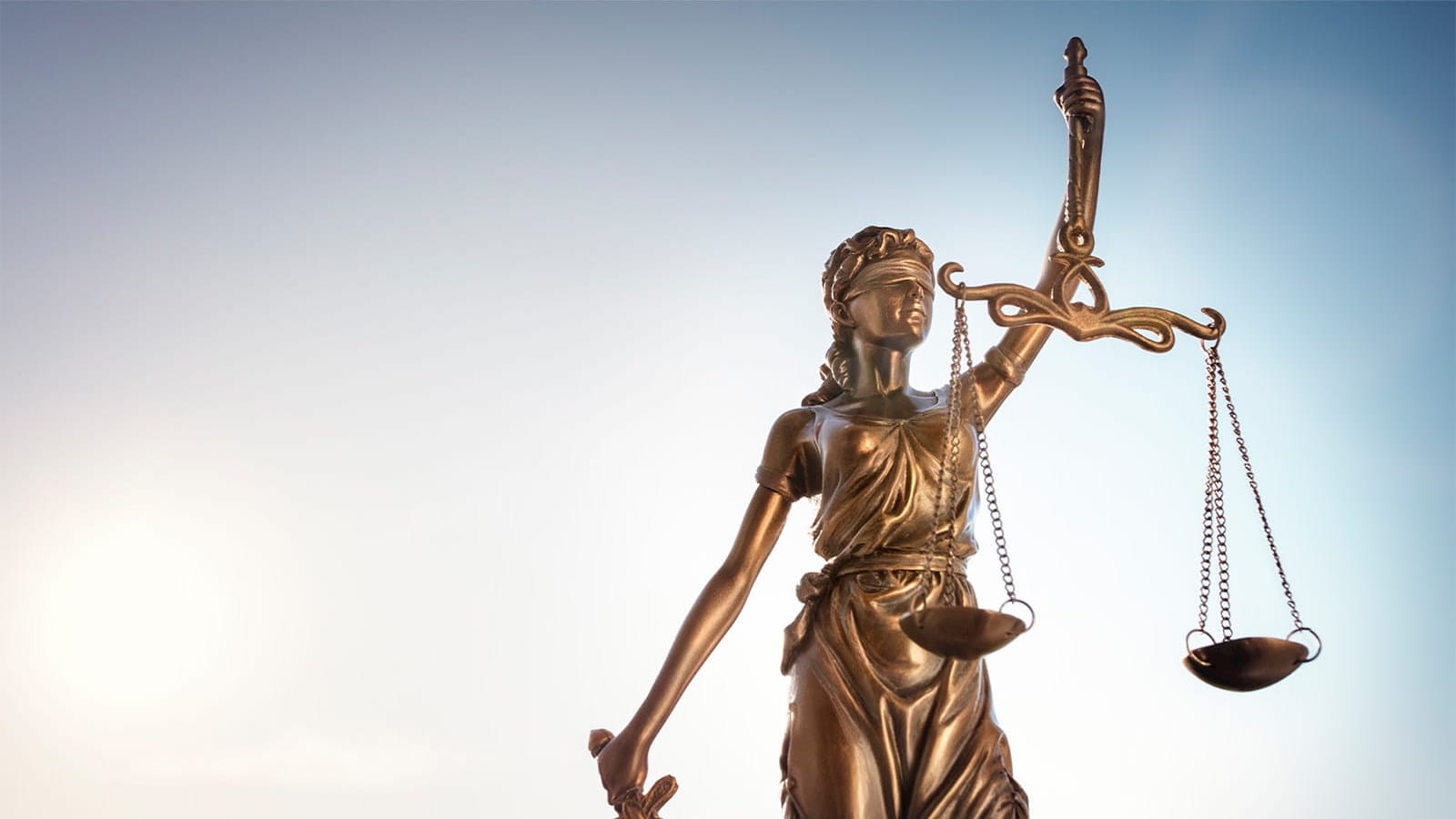 ICAEW Taxline tax domicile taxpayer lady justice statue bronze court case