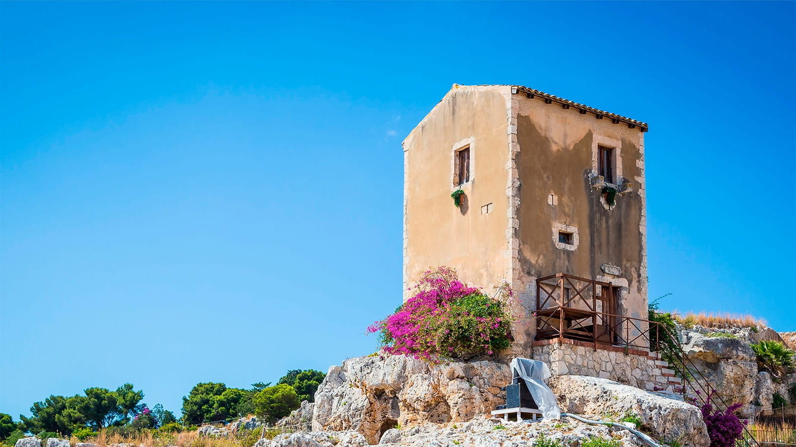 Italian villa house building stone blue sky property tax ICAEW Taxline