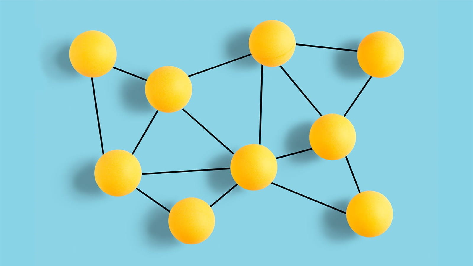 yellow balls circles connected together with black lines on a blue background