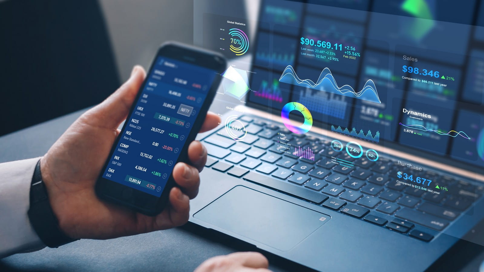 Business person analysing financial data on virtual screen.