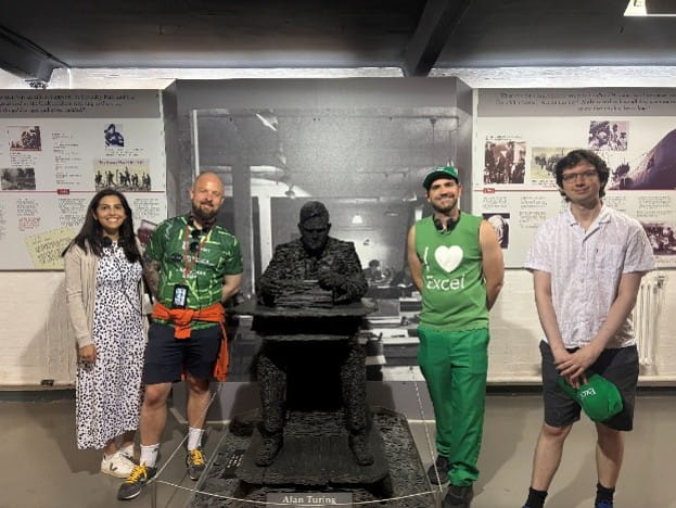 a group of people gathered around a statue in a museum