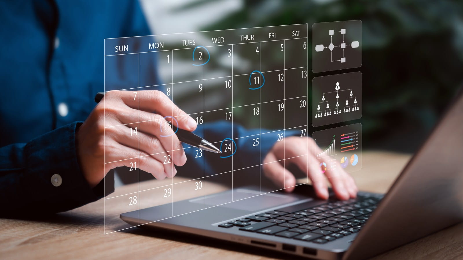 Laptop with a digital image of a monthly calendar floating above it