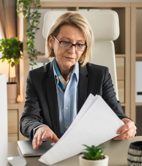 professional looking at her papers