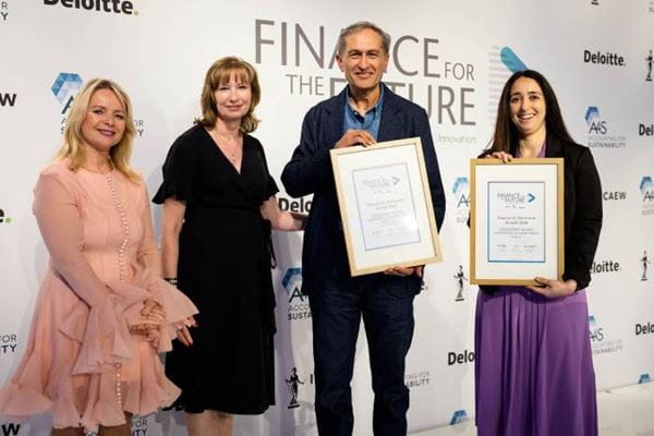 Photo of Harmit Singh and a representative from Vodafone receiving their joint Leadership Awards for Communicating Integrated Thinking at the Finance for the Future Awards 2026